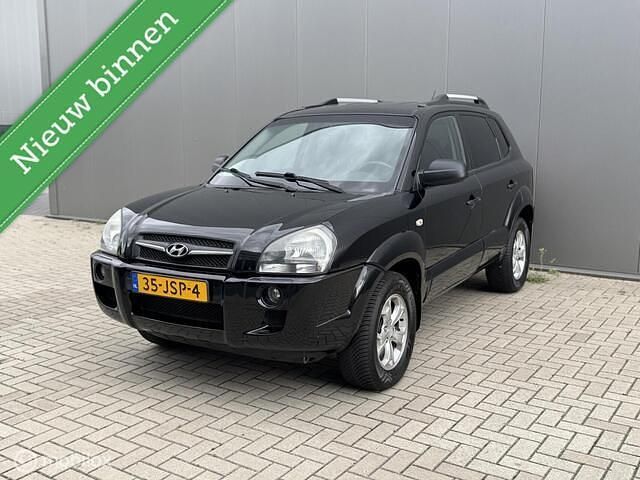 Zwart Gebruikt 2009 Hyundai Tucson Dynamiq SUV | € 2.750 (Eerlijke prijs) - Afbeelding 1/4
