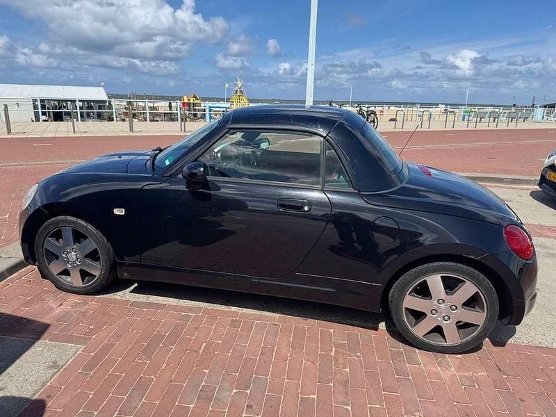 Zwart Gebruikt 2004 Daihatsu Copen Cabriolet | € 2.000 - Afbeelding 1/4