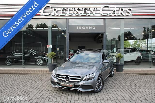 , metallic lak Gebruikt 2016 Mercedes C180 Prestige Stationwagen | € 22.500 (Duur) - Afbeelding 1/4