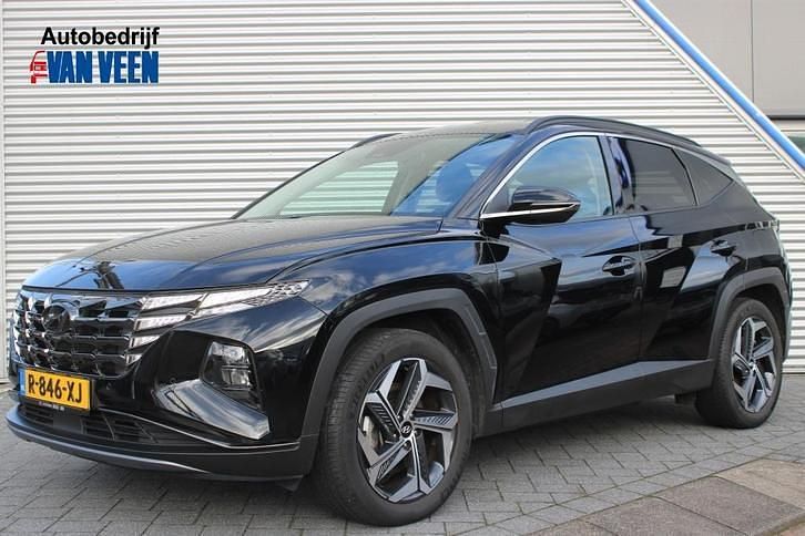 Phantom black metallic (zwart metallic) Gebruikt 2021 Hyundai Tucson Comfort SUV | € 28.945 (Eerlijke prijs) - Afbeelding 1/4