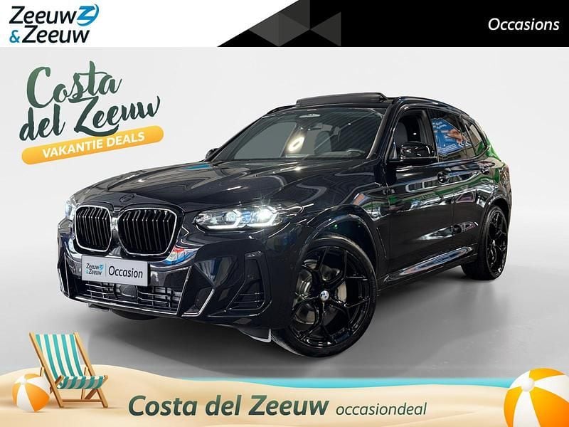 M carbonschwarz Gebruikt 2023 BMW iX3 Executive SUV | € 46.990 (Goede deal) - Afbeelding 1/4