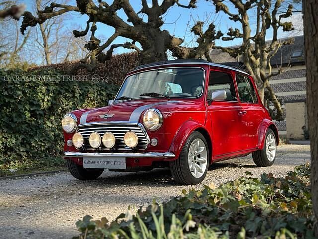 Roodsolar red Gebruikt 2000 Mini Cooper Sport Hatchback | € 29.950 - Afbeelding 1/4