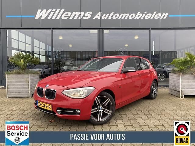Rood Gebruikt 2012 BMW 118 Executive Hatchback | € 12.500 (Eerlijke prijs) - Afbeelding 1/4