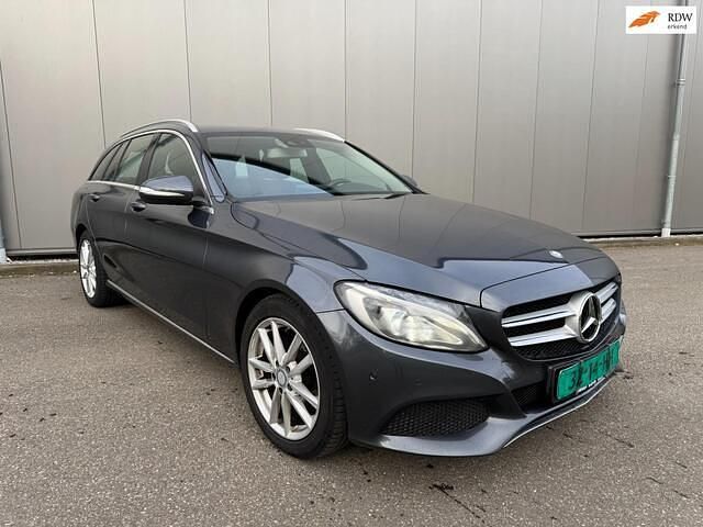 Grijs Gebruikt 2015 Mercedes C180 Prestige Stationwagen | € 11.500 (Goede deal) - Afbeelding 1/4
