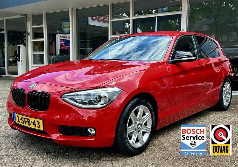 Rood Gebruikt 2013 BMW 116 Hatchback | € 8.400 (Eerlijke prijs) - Afbeelding 1/4