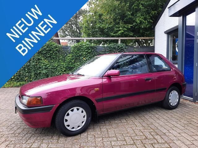 Paars Gebruikt 1993 Mazda 323 Hatchback | € 5.950 - Afbeelding 1/4