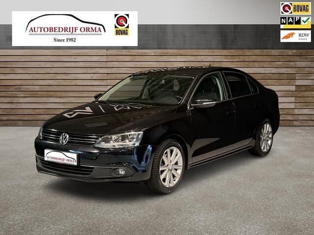 Zwart (metallic) Occasion 2012 VW Jetta Comfortline Sedan | € 5.495 (Eerlijke prijs) - Afbeelding 1/4