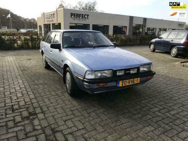 Blauw Gebruikt 1984 Mazda 626 Sedan | € 2.000 - Afbeelding 1/4