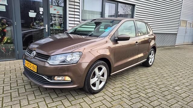 Bruin Gebruikt 2014 VW Polo Highline Hatchback | € 8.750 (Eerlijke prijs) - Afbeelding 1/4