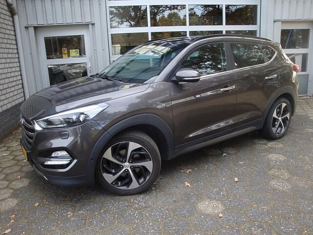 Bruin Occasion 2017 Hyundai Tucson Premium SUV | € 21.900 (Eerlijke prijs) - Afbeelding 1/4