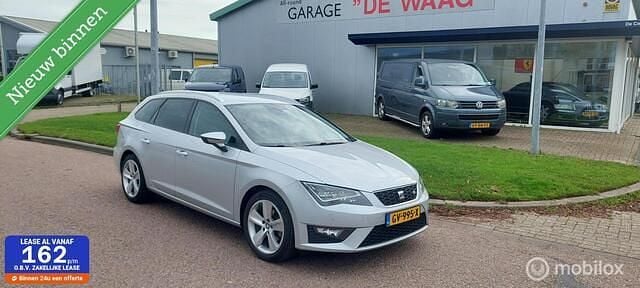 Grijs (metallic) Gebruikt 2015 Seat Leon ST FR Stationwagen | € 9.850 (Eerlijke prijs) - Afbeelding 1/4