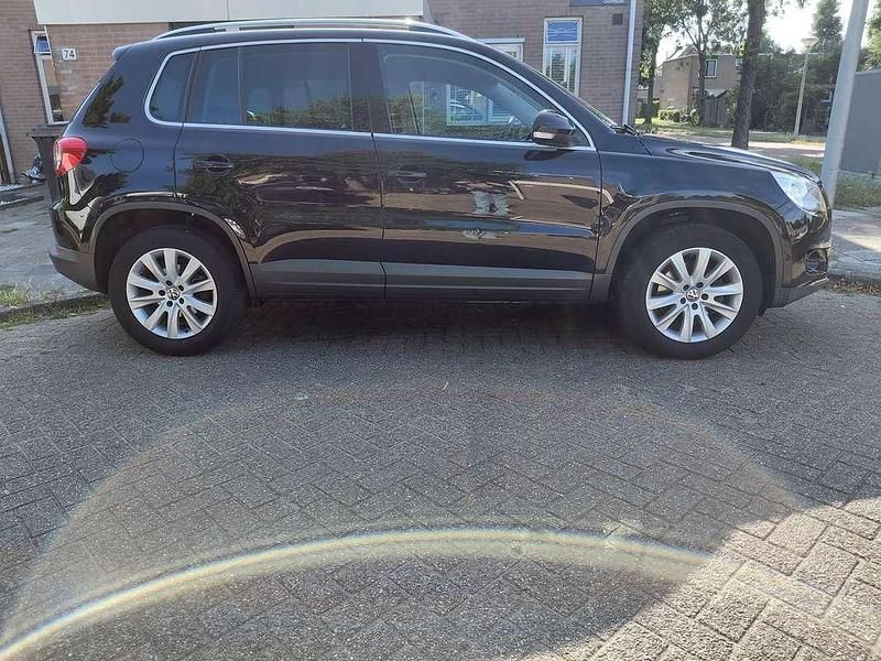 Zwart Gebruikt 2010 VW Tiguan Sportline SUV | € 5.500 (Super prijs) - Afbeelding 1/4