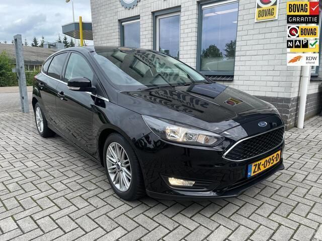 Zwart, metallic lak Gebruikt 2018 Ford Focus Trend Hatchback | € 14.750 (Eerlijke prijs) - Afbeelding 1/4