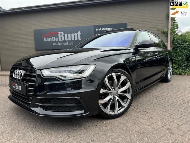 Zwart Gebruikt 2014 Audi A6 Sport Stationwagen | € 15.999 (Iets duurder) - Afbeelding 1/4