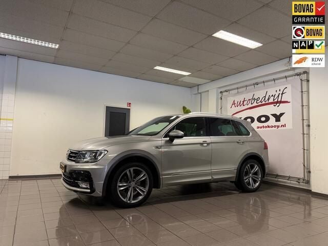 Grijs, metallic lak Gebruikt 2016 VW Tiguan R-line SUV | € 18.975 (Eerlijke prijs) - Afbeelding 1/4
