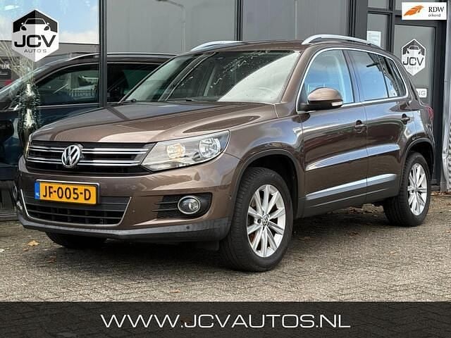 Bruin Gebruikt 2012 VW Tiguan Sport SUV | € 5.988 (Goede deal) - Afbeelding 1/4