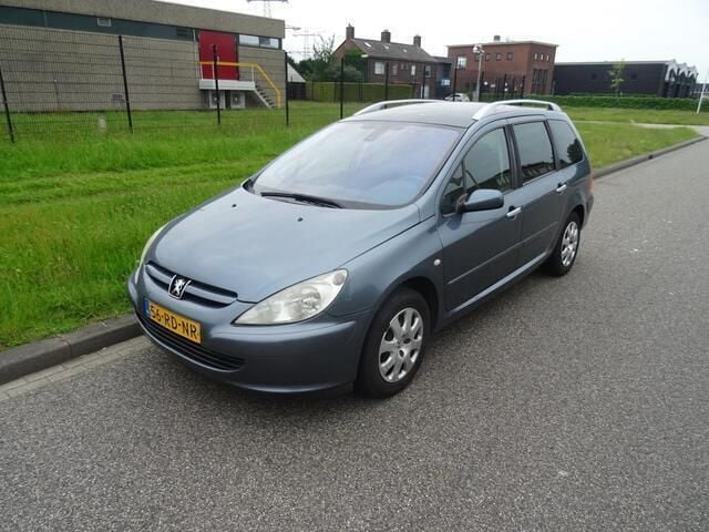 Grijs Gebruikt 2005 Peugeot 307 Premium Stationwagen | € 1.295 (Eerlijke prijs) - Afbeelding 1/4
