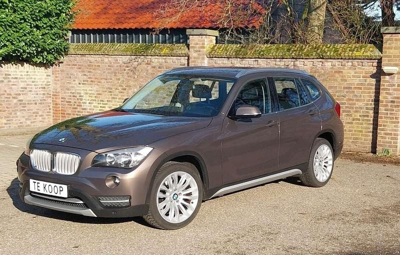 Bruin Occasion 2013 BMW X1 SUV | € 10.450 (Eerlijke prijs) - Afbeelding 1/4