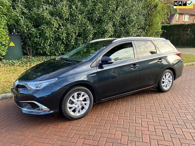 Blauw (metallic) Gebruikt 2015 Toyota Auris Touring Sports Stationwagen | € 9.450 (Eerlijke prijs) - Afbeelding 1/4