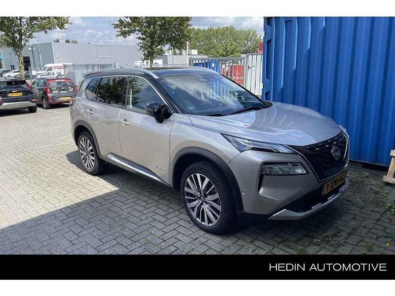 2tone (champagne silver/black) Gebruikt 2023 Nissan X-Trail Tekna+ SUV | € 42.890 (Iets duurder) - Afbeelding 1/3