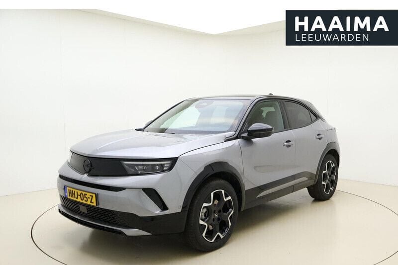Grijs Gebruikt 2025 Opel Mokka-e Comfort SUV | € 34.950 - Afbeelding 1/4