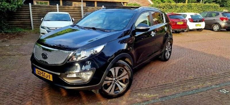 Zwart Gebruikt 2012 Kia Sportage SUV | € 9.000 (Eerlijke prijs) - Afbeelding 1/4