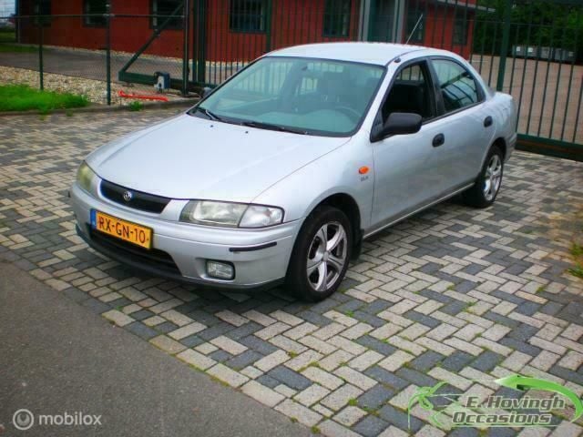 Grijs Gebruikt 1997 Mazda 323 Sedan | € 1.250 - Afbeelding 1/4