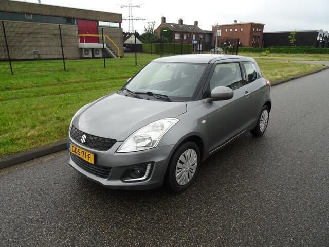 Grijs Gebruikt 2017 Suzuki Swift Comfort Hatchback | € 6.695 (Eerlijke prijs) - Afbeelding 1/4