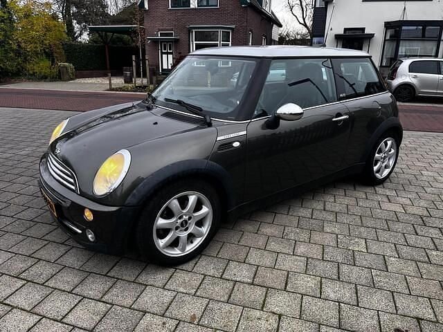 Bruin Gebruikt 2006 Mini Cooper Hatchback | € 2.399 (Super prijs) - Afbeelding 1/4