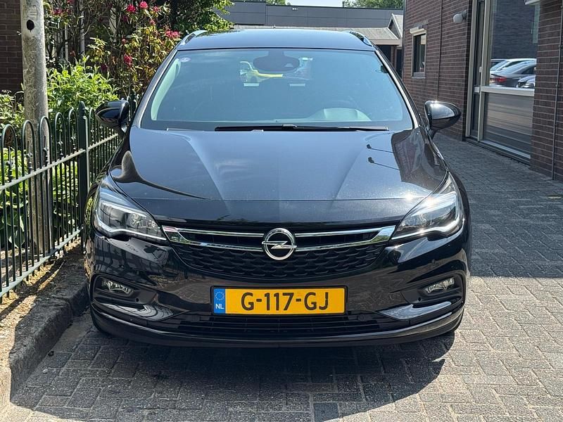 Occasion Opel Astra Business 105 PK (77 kW) 2019 Zwart, metallic lak Stationwagen