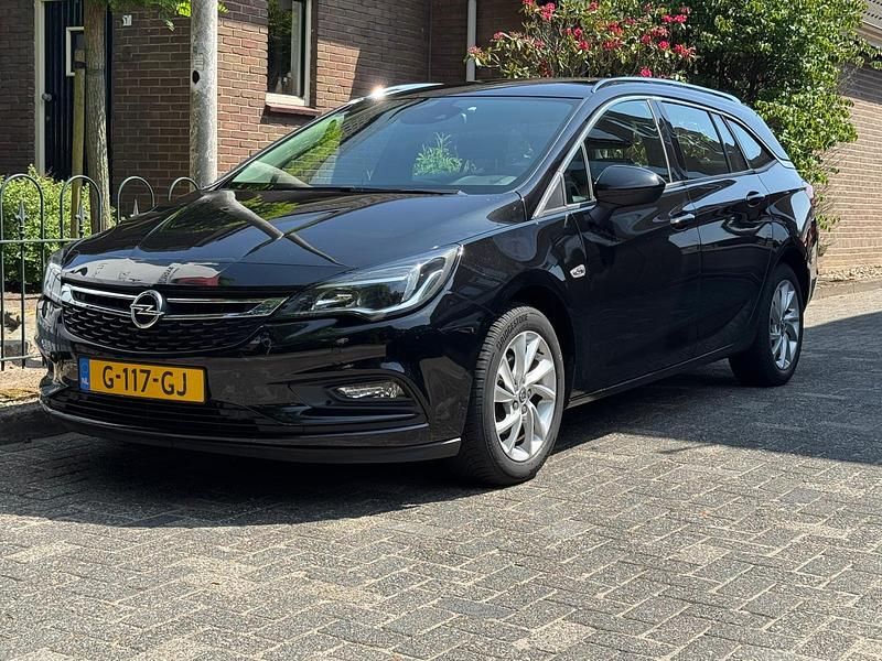 Occasion Opel Astra Business 105 PK (77 kW) 2019 Zwart, metallic lak Stationwagen