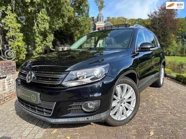 Zwart Gebruikt 2014 VW Tiguan Sport SUV | € 13.744 (Eerlijke prijs) - Afbeelding 1/4