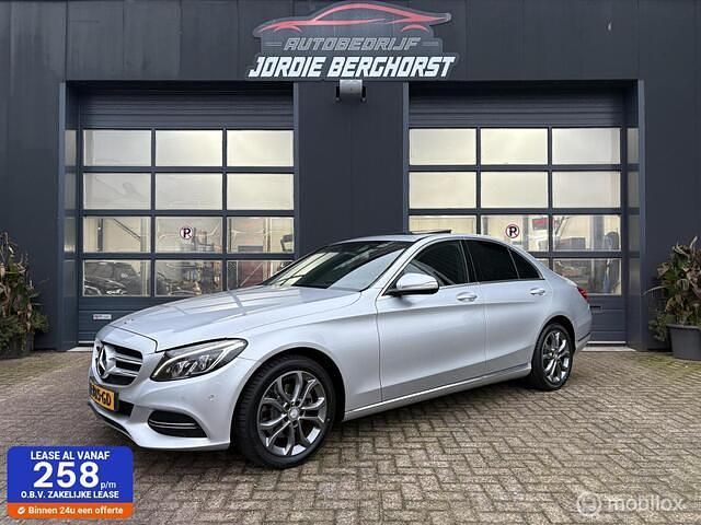 Grijs Occasion 2014 Mercedes C200 Prestige Sedan | € 15.950 (Eerlijke prijs) - Afbeelding 1/4