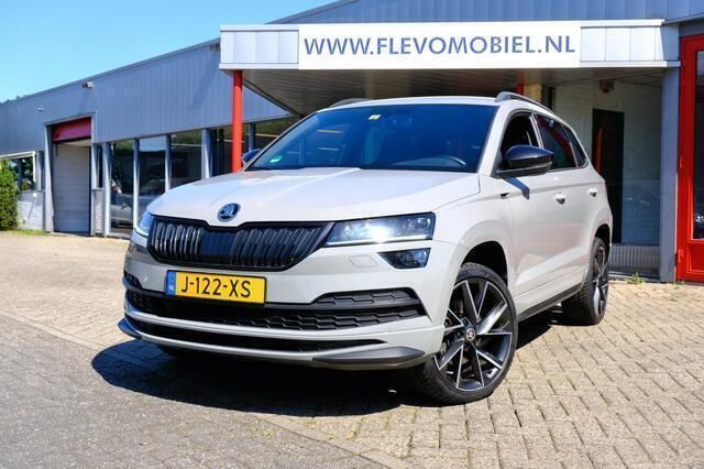 Grijs Gebruikt 2021 Skoda Karoq SportLine SUV | € 20.950 (Goede deal) - Afbeelding 1/4