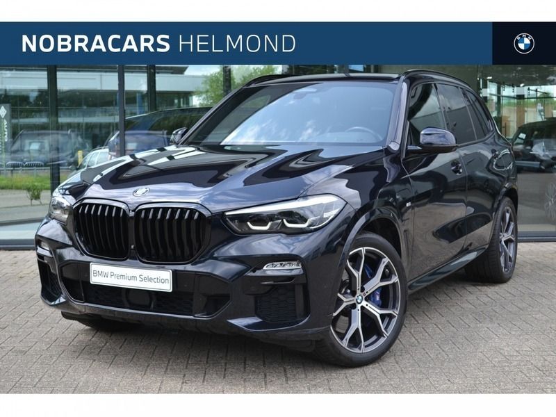 M carbonschwarz (donker zwart metallic) Gebruikt 2021 BMW X5 Comfort Edition SUV | € 58.950 (Goede deal) - Afbeelding 1/4