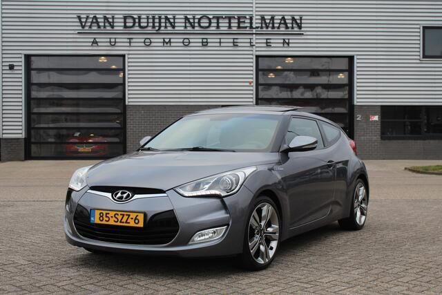 Grijs, metallic lak Occasion 2012 Hyundai Veloster Hatchback | € 11.950 (Duur) - Afbeelding 1/4