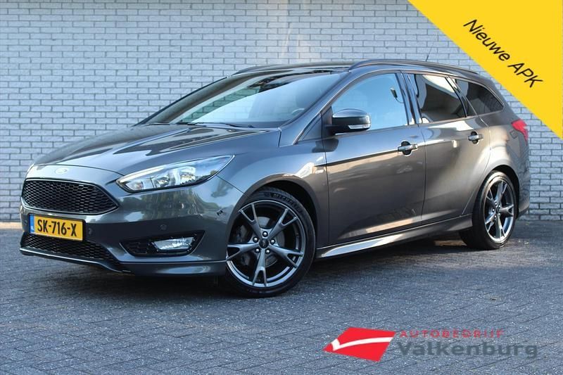 Grijs, metallic lak Gebruikt 2018 Ford Focus ST-Line Stationwagen | € 13.950 (Eerlijke prijs) - Afbeelding 1/4