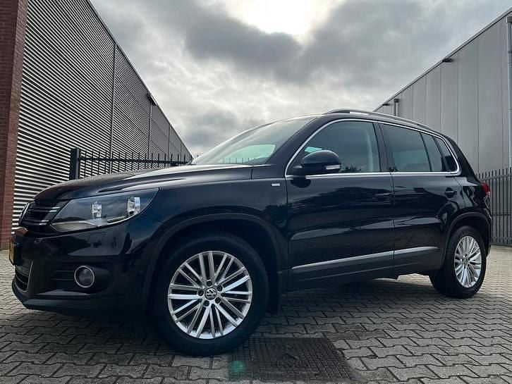 Zwart Gebruikt 2014 VW Tiguan Sport SUV | € 9.250 (Goede deal) - Afbeelding 1/4