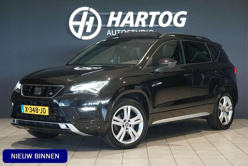 Zwart Gebruikt 2019 Seat Ateca 4Drive SUV | € 26.400 (Eerlijke prijs) - Afbeelding 1/4
