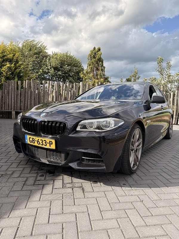 Zwart Gebruikt 2014 BMW 550 Stationwagen | € 18.000 - Afbeelding 1/4