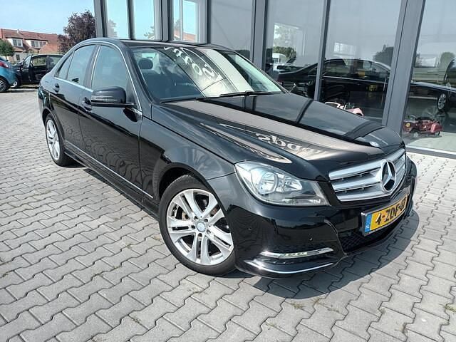 Zwart Gebruikt 2013 Mercedes C180 Ambition Sedan | € 14.250 (Eerlijke prijs) - Afbeelding 1/4