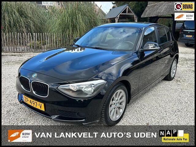Zwart Gebruikt 2012 BMW 114 Hatchback | € 6.495 (Goede deal) - Afbeelding 1/4