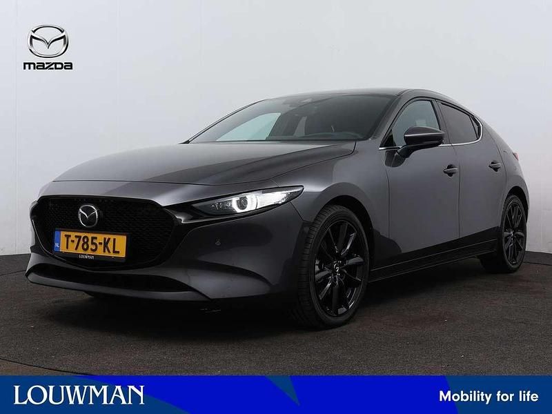 Grijs Gebruikt 2023 Mazda 3 Luxury Hatchback | € 36.945 - Afbeelding 1/3