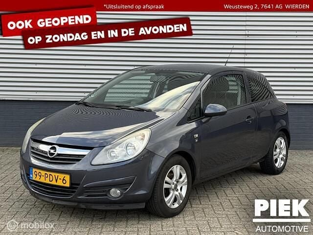 Blauw Gebruikt 2011 Opel Corsa Cosmo Hatchback | € 1.199 (Eerlijke prijs) - Afbeelding 1/3