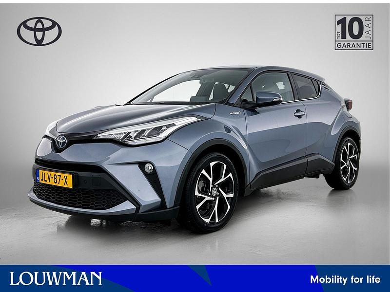 Grijs metallic Gebruikt 2021 Toyota C-HR SUV | € 23.945 (Eerlijke prijs) - Afbeelding 1/4