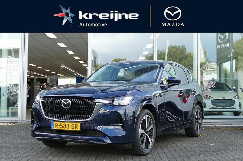 Deep crystal blue Gebruikt 2022 Mazda CX-60 Takumi-Line SUV | € 38.925 (Eerlijke prijs) - Afbeelding 1/4