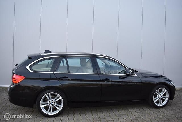 Occasion BMW 330 Executive 252 PK (185 kW) 2017 Zwart Stationwagen