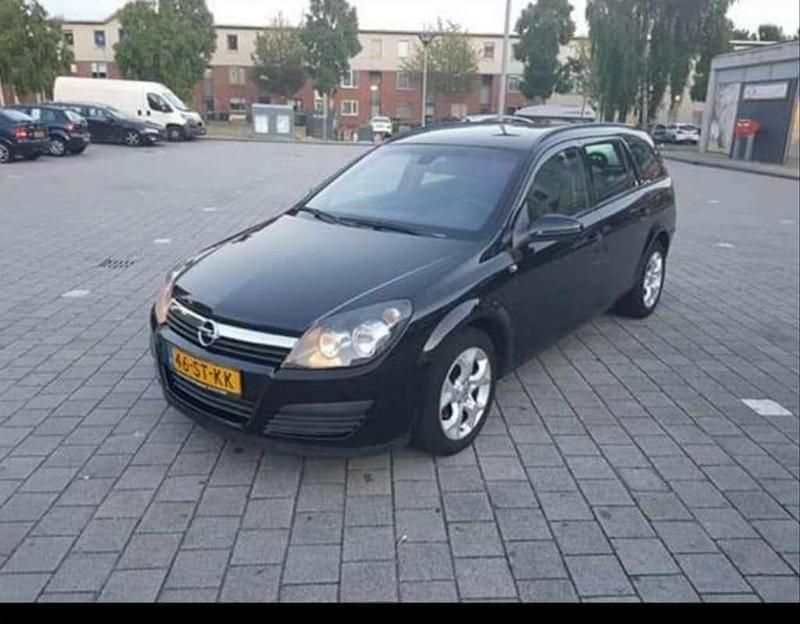 Zwart Occasion 2006 Opel Astra Executive Stationwagen | € 1.000 (Super prijs) - Afbeelding 1/4