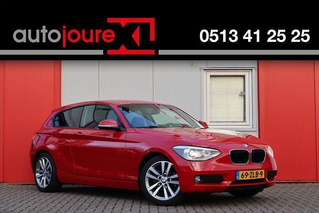 Rood Gebruikt 2013 BMW 116 Sport Line Hatchback | € 5.450 (Eerlijke prijs) - Afbeelding 1/4