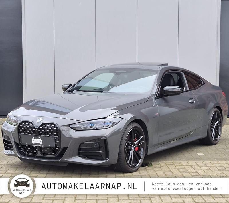 Grijs Occasion 2022 BMW M440 Executive Sedan | € 53.840 - Afbeelding 1/4